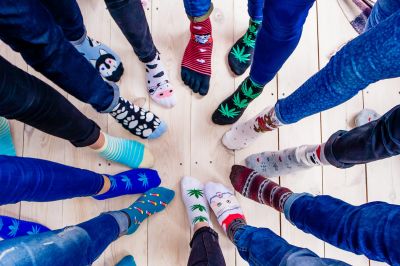 Colourful,Socks,,Jeans,And,Feet