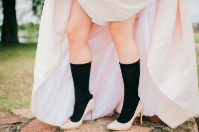 Unrecognizable,Woman,Legs,In,Men,Black,Socks,And,High,Heels